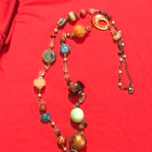 Multi size beads on a link necklace